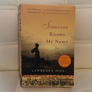 "Someone Knows My Name" - Cream/Brown Paperback Novel